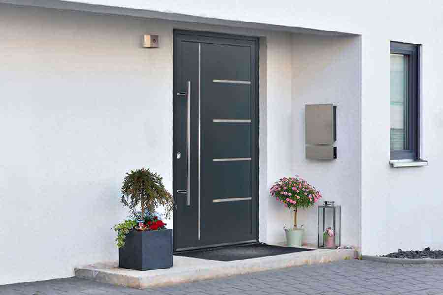 grey modern aluminium front door with long bar handle