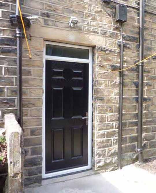 solid 6 panel black front door with top light