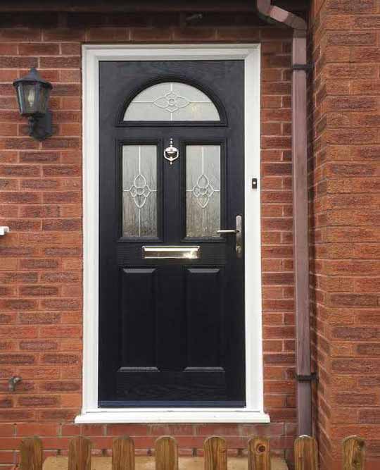 black composite door with triple glazing in a white frame